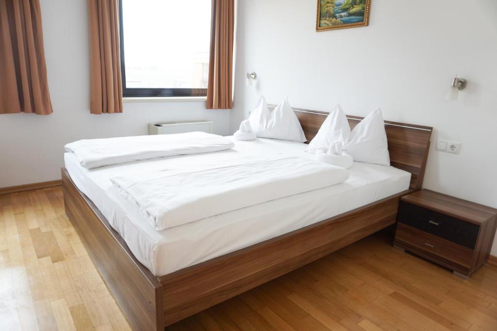 Postel nebo postele na pokoji v ubytování Hotel Kaffeemühle