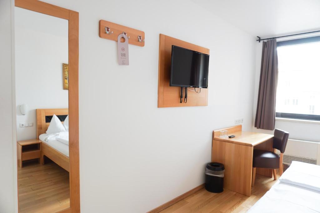 TV a/nebo společenská místnost v ubytování Hotel Kaffeemühle