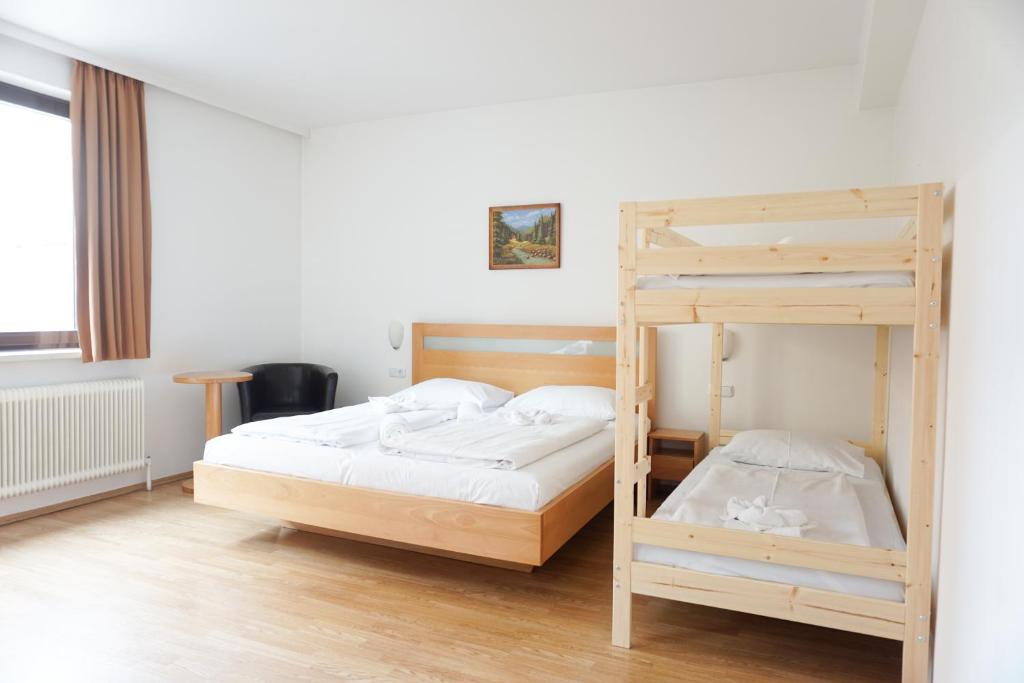 Postel nebo postele na pokoji v ubytování Hotel Kaffeemühle