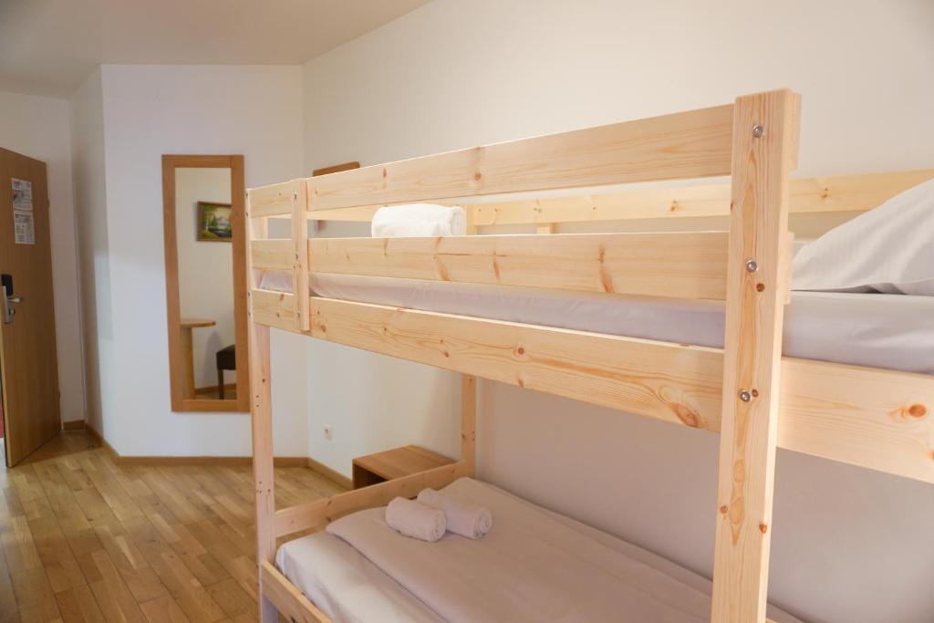 Postel nebo postele na pokoji v ubytování Hotel Kaffeemühle