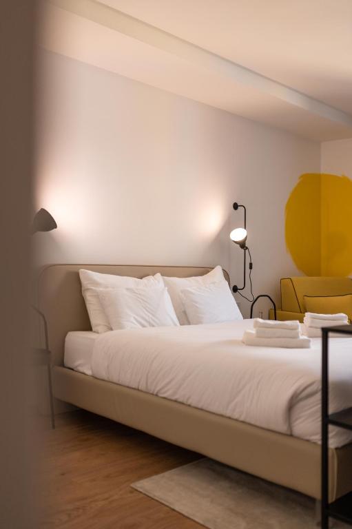 Postel nebo postele na pokoji v ubytování Guesthouse diWINE
