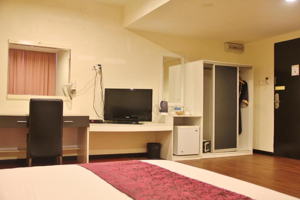TV a/nebo společenská místnost v ubytování Prince Hotel