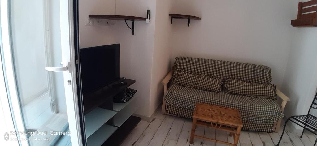 TV a/nebo společenská místnost v ubytování Dimora Privata