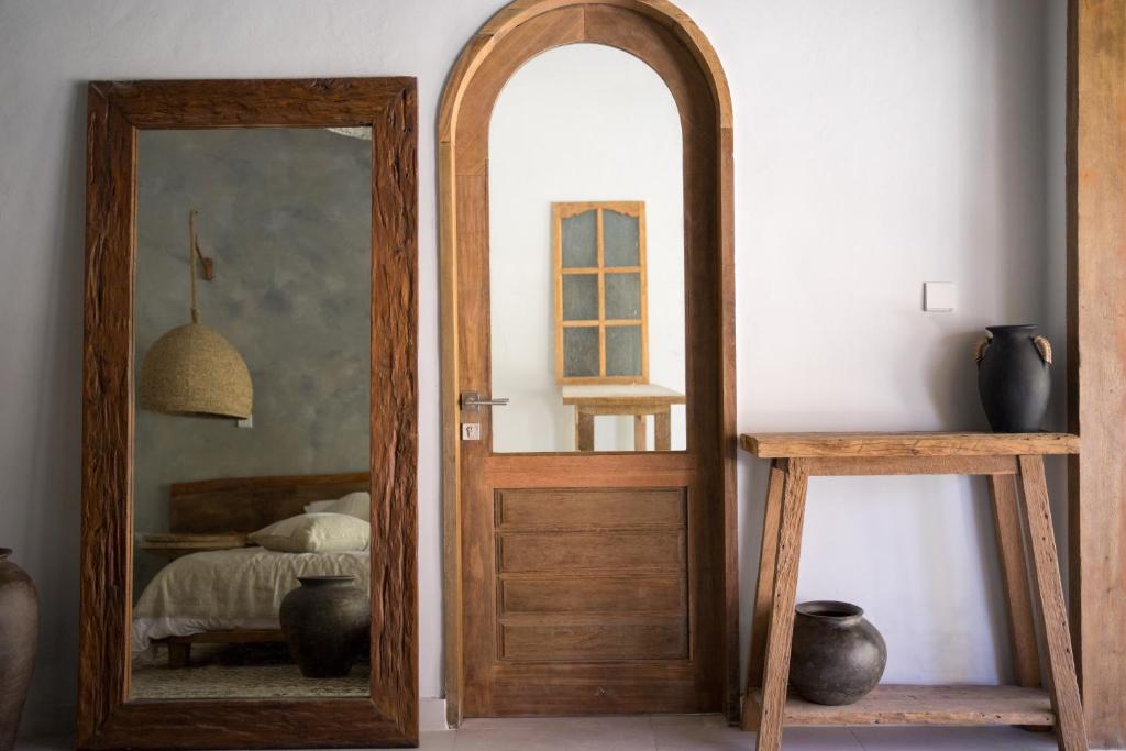 Postel nebo postele na pokoji v ubytování Nagara Boutique Hotel