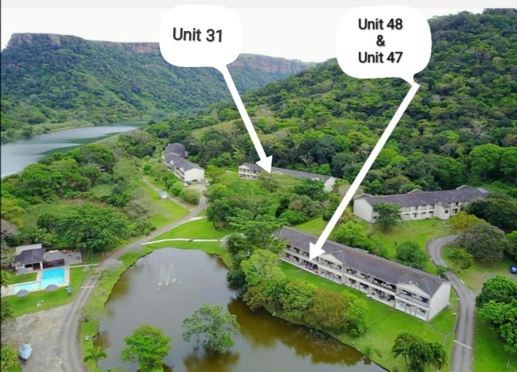 an aerial view of a house and a river at Eden Wilds Unit 48 & 47 & 31 in Port Edward