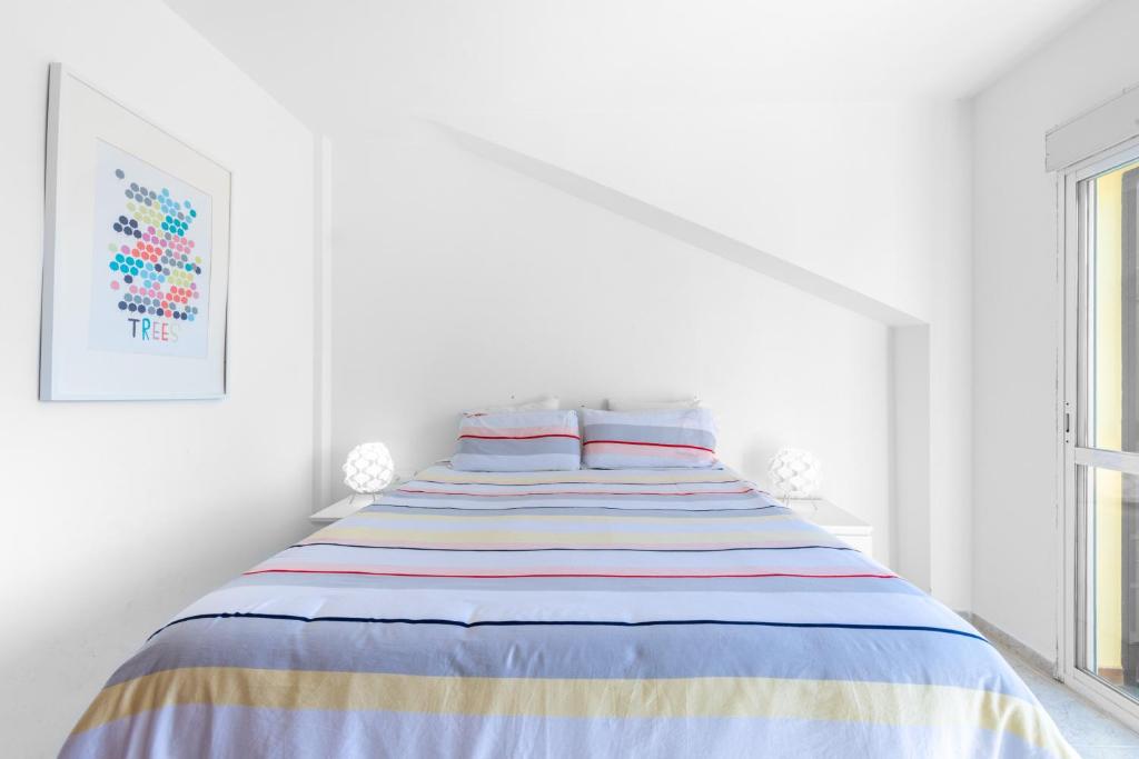Posteľ alebo postele v izbe v ubytovaní Townhouse Calahonda