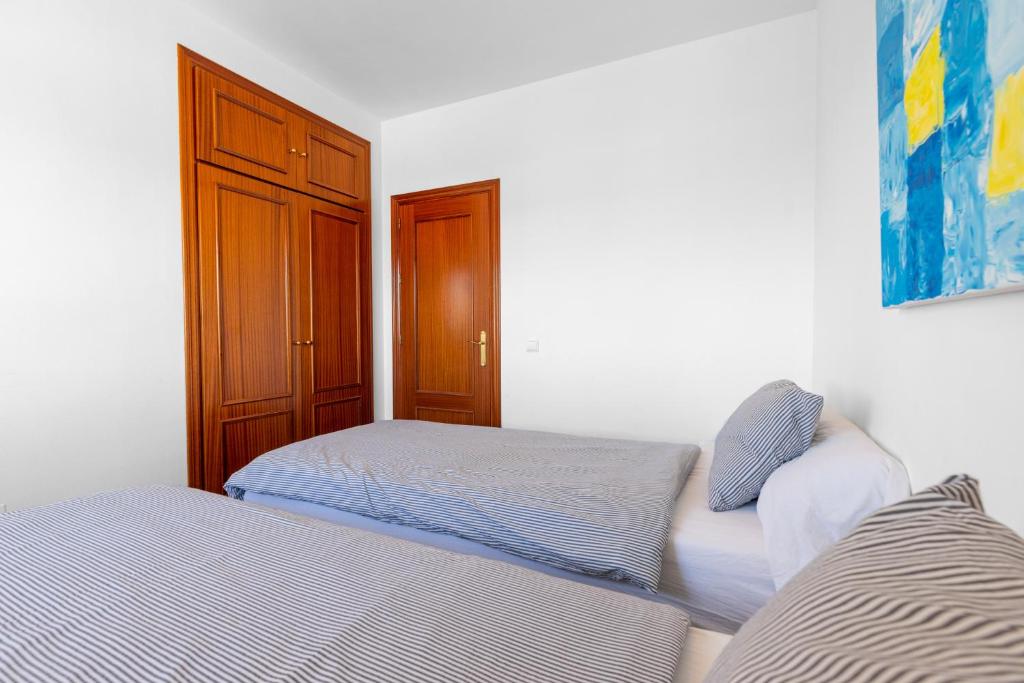 Posteľ alebo postele v izbe v ubytovaní Townhouse Calahonda