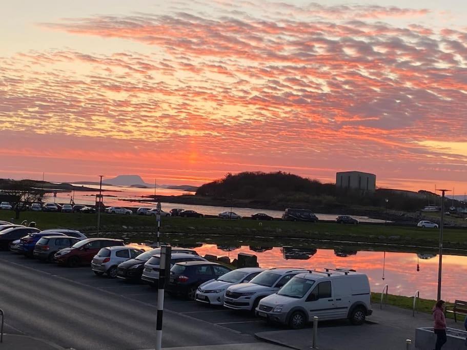 a parking lot with a bunch of cars parked at Sea View, 1st Floor, Harbour Mill, Westport Quay in Westport