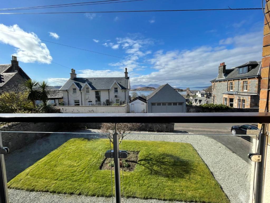 a view from the balcony of a house at Dalriach Apartment in Oban