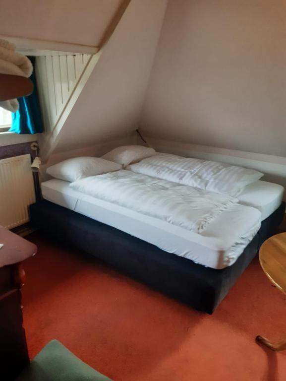 Postel nebo postele na pokoji v ubytování Villa Zomerdijk