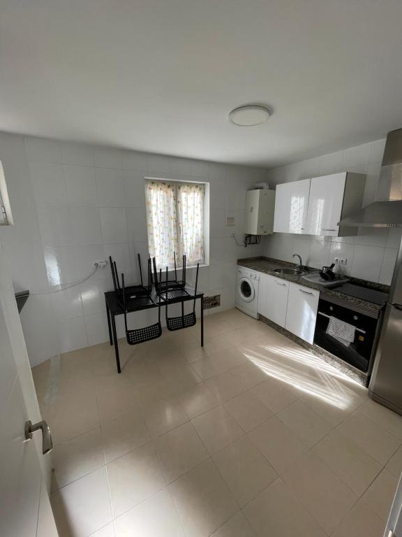Kuchyň nebo kuchyňský kout v ubytování Apartamento Espolón