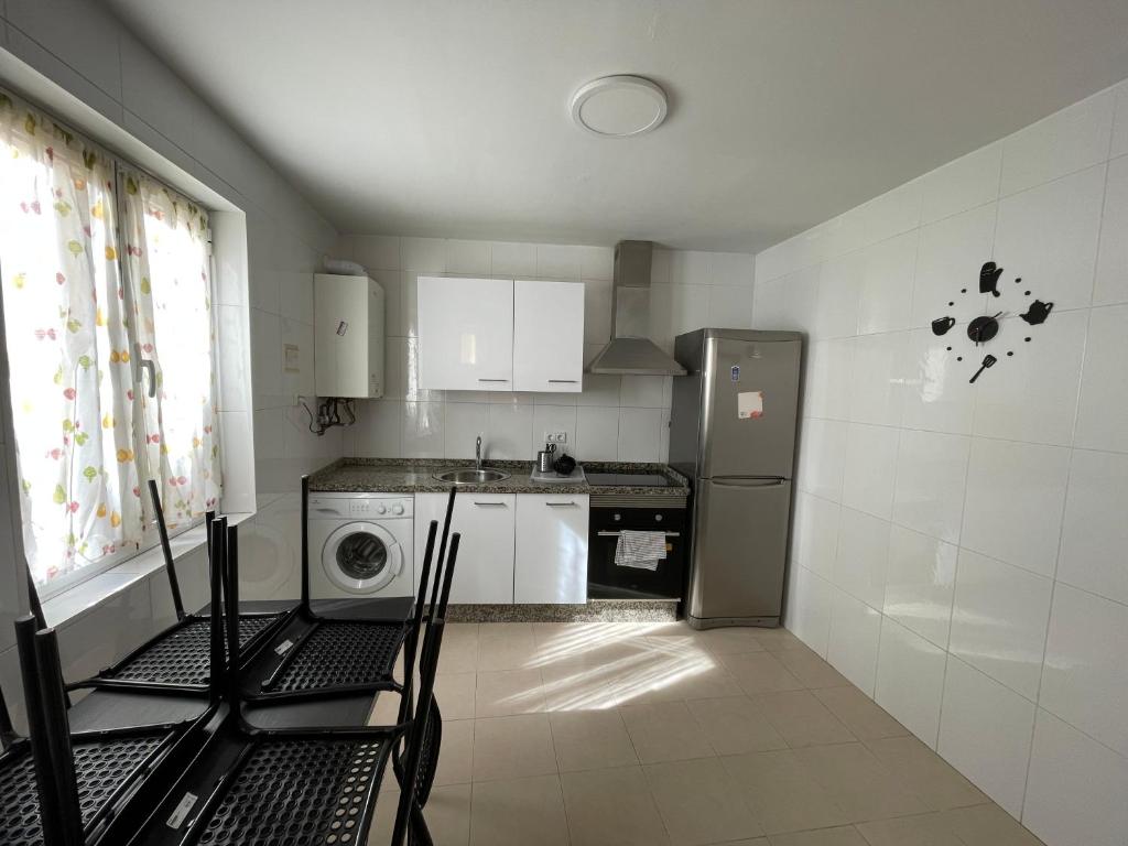 Kuchyň nebo kuchyňský kout v ubytování Apartamento Espolón