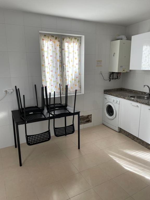 Kuchyň nebo kuchyňský kout v ubytování Apartamento Espolón