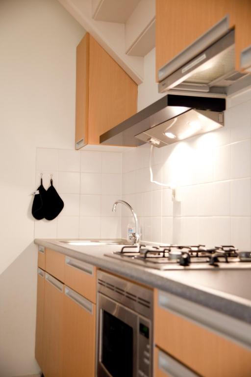 Kuchyň nebo kuchyňský kout v ubytování Gelkingehof Aparthotel