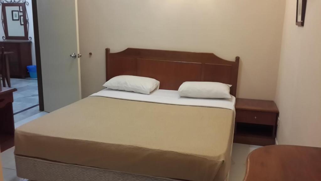 Un ou plusieurs lits dans un hébergement de l'établissement Golden City Apartment - Leisure Holiday Resorts