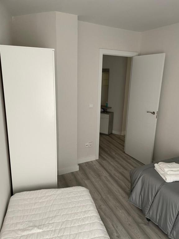 Postel nebo postele na pokoji v ubytování Apartamento Espolón