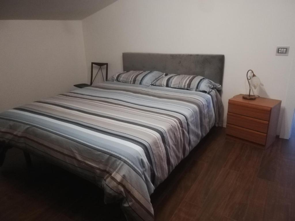 Postel nebo postele na pokoji v ubytování Il sospiro