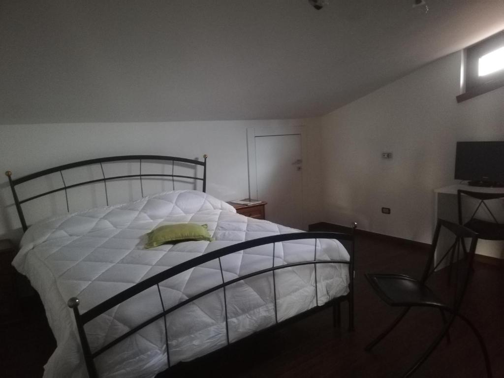 Postel nebo postele na pokoji v ubytování Il sospiro