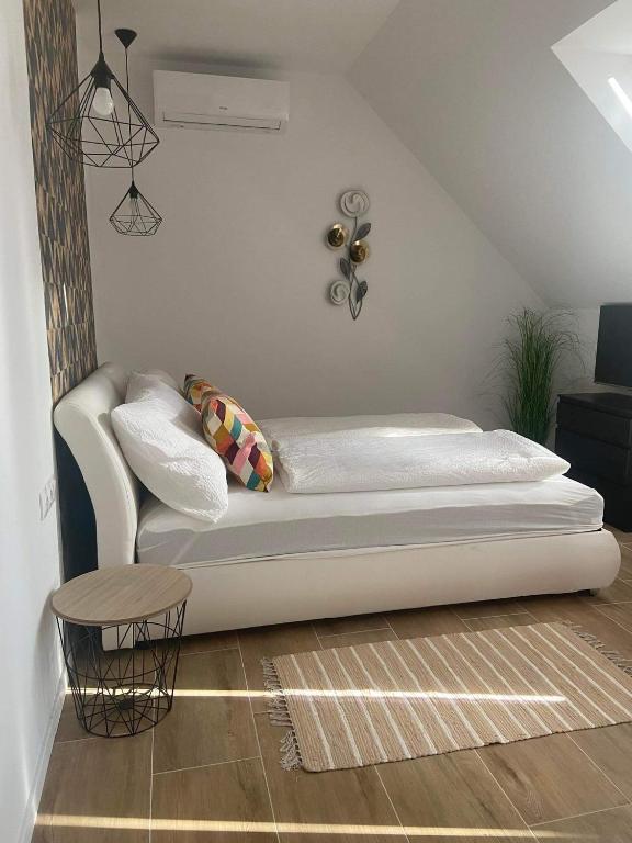 Postel nebo postele na pokoji v ubytování Villa Corner