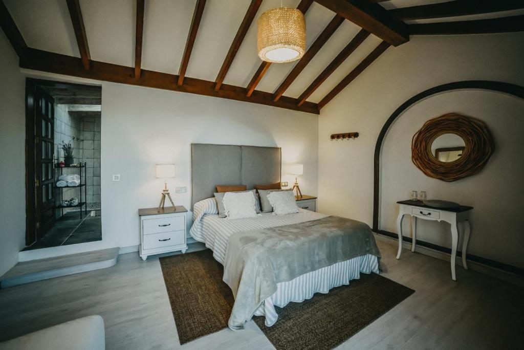 Ένα ή περισσότερα κρεβάτια σε δωμάτιο στο Casona de Tao