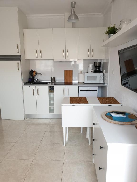 Kuchyň nebo kuchyňský kout v ubytování 059 Bungalow Torrelamata