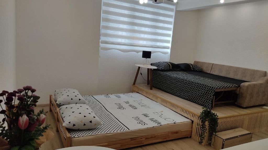 Posezení v ubytování Studio Apartment - A Bit Of Joy