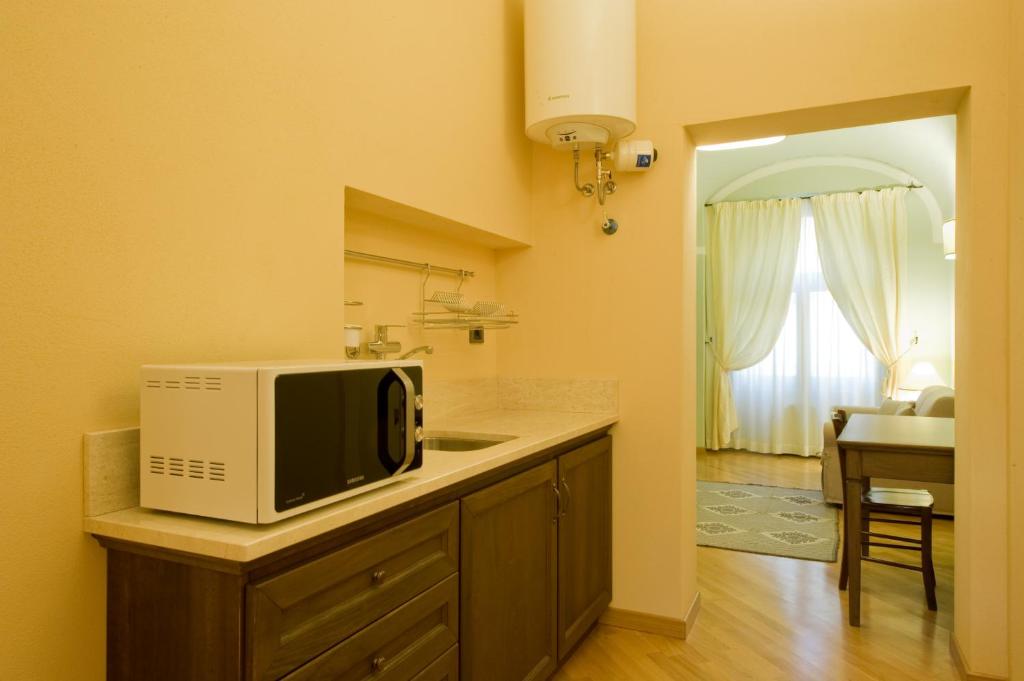 Küche/Küchenzeile in der Unterkunft Piazza Azuni 18 Guest House