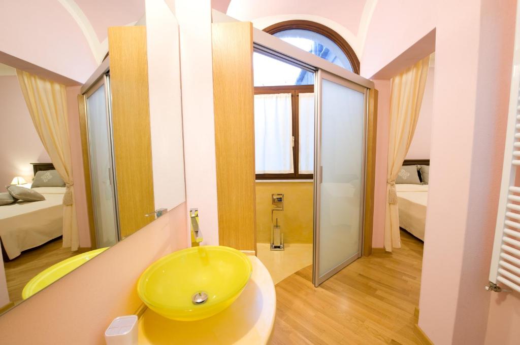 Ein Bett oder Betten in einem Zimmer der Unterkunft Piazza Azuni 18 Guest House