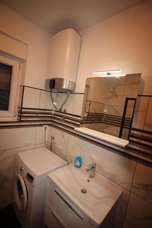Kúpeľňa v ubytovaní Moderan apartman u blizini mora