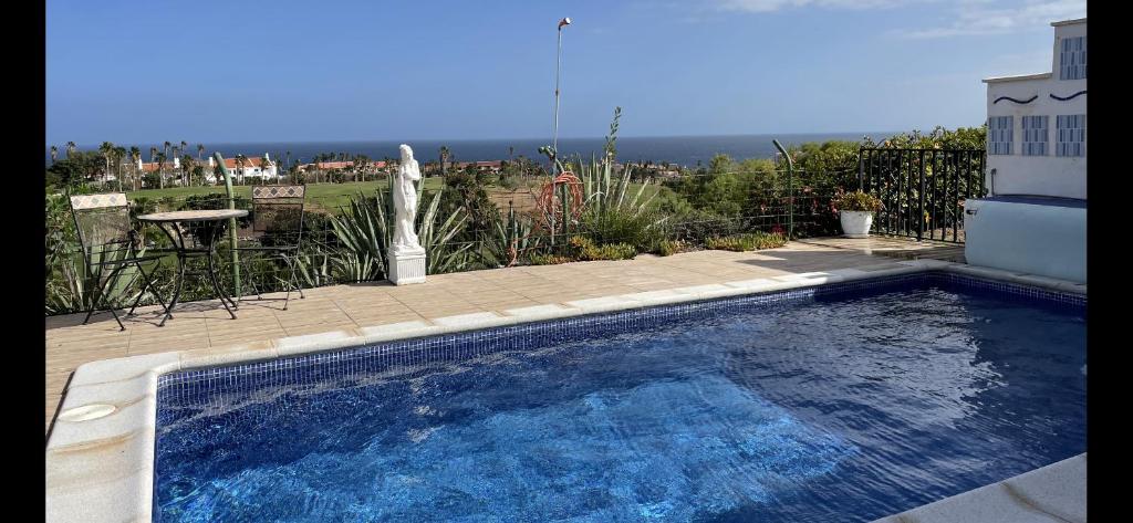 Gallery image of house private heated pool amazing view on golf ocean 3 bedrooms 3 bathrooms 6 to 8 adults 3-17 years old children being considered adults and in addition 0-2 years old children are welcome for free in San Miguel de Abona