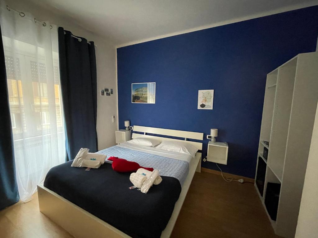 Łóżko lub łóżka w pokoju w obiekcie AD Trastevere Guest House - by AD Roma
