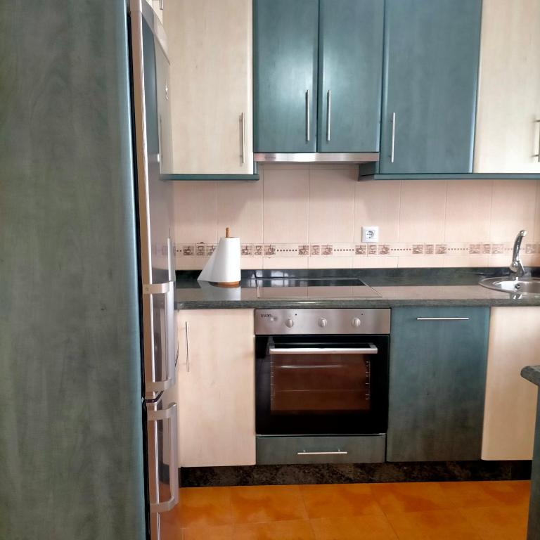 Kuchyňa alebo kuchynka v ubytovaní A casa do clarete