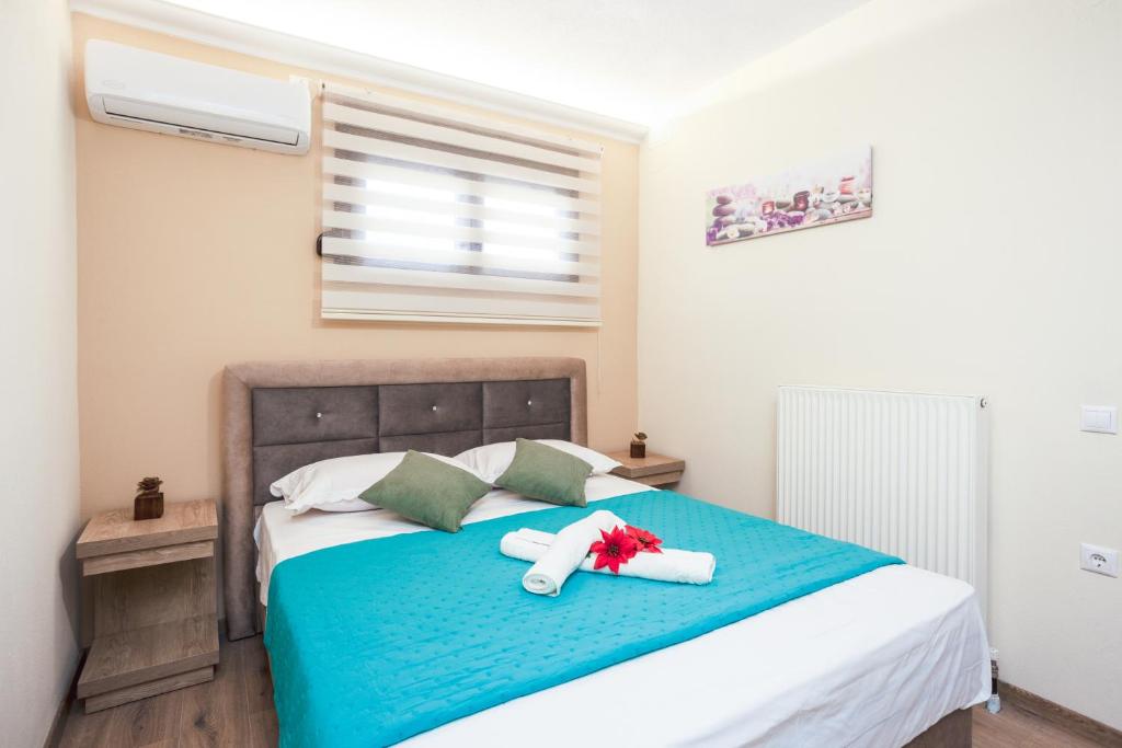 Postel nebo postele na pokoji v ubytování TwinStars Maisonette