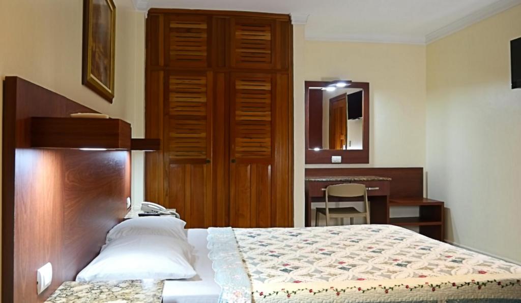 Voodi või voodid majutusasutuse Hotel Castilla toas