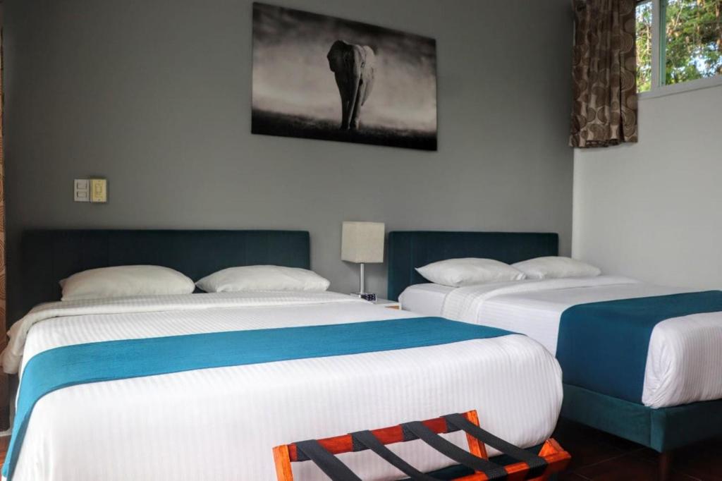 Postel nebo postele na pokoji v ubytování Casa Gem B&B
