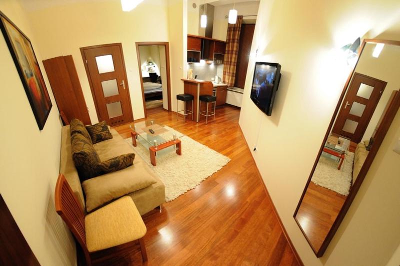 Televízia a/alebo spoločenská miestnosť v ubytovaní Atena - Pantheon Apartments