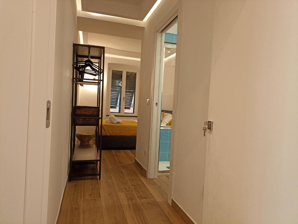 Кровать или кровати в номере Al Porto 61 - Rooms for Rent