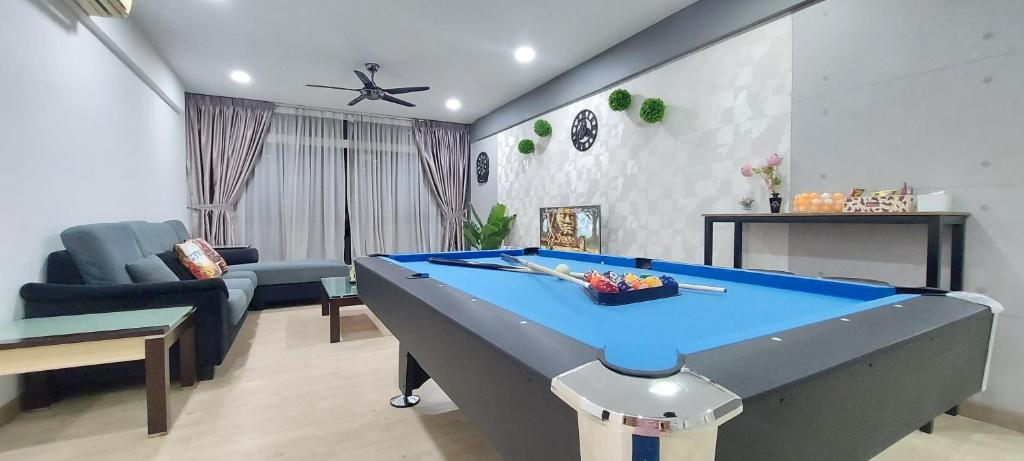 a living room with a pool table in it at Fahrenheit 88, Kuala Lumpur 19 in Kuala Lumpur