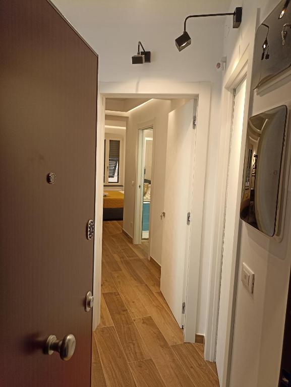 Телевизор и/или развлекательный центр в Al Porto 61 - Rooms for Rent