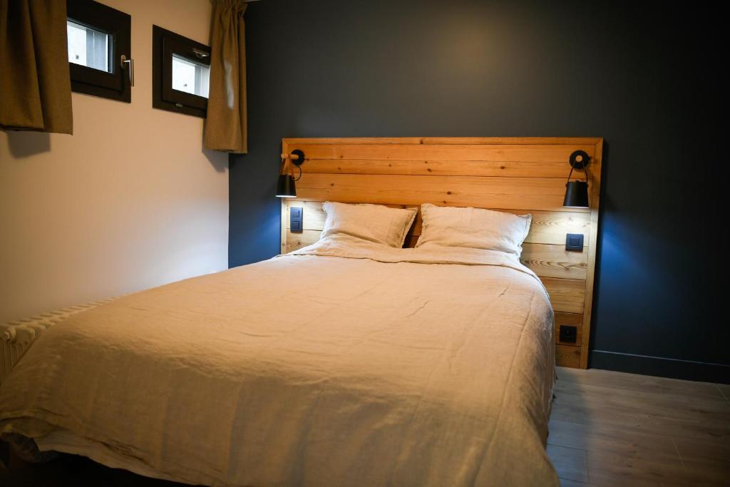 Postel nebo postele na pokoji v ubytování Appartement Vieux Servoz Mt Blanc