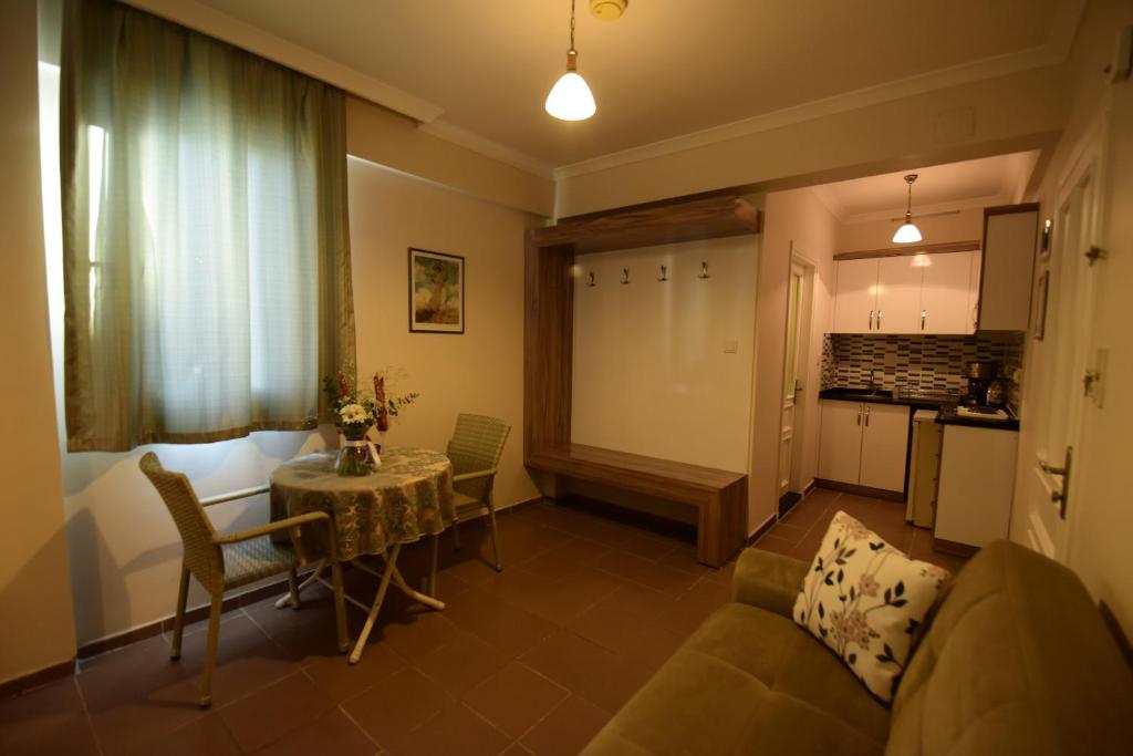 Kuchyň nebo kuchyňský kout v ubytování Narcis Apart Hotel