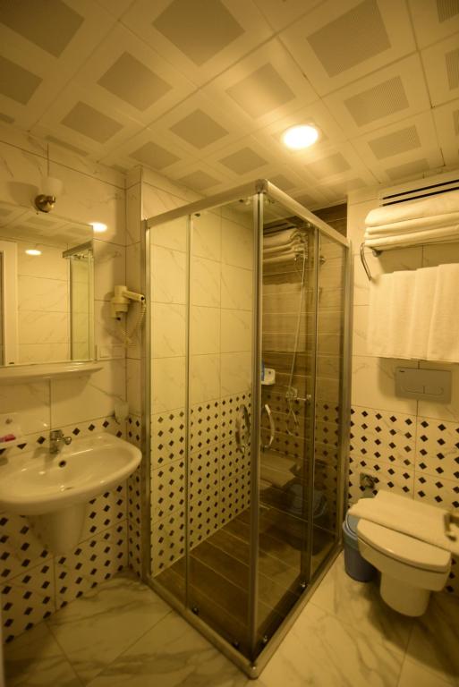 Koupelna v ubytování Narcis Apart Hotel