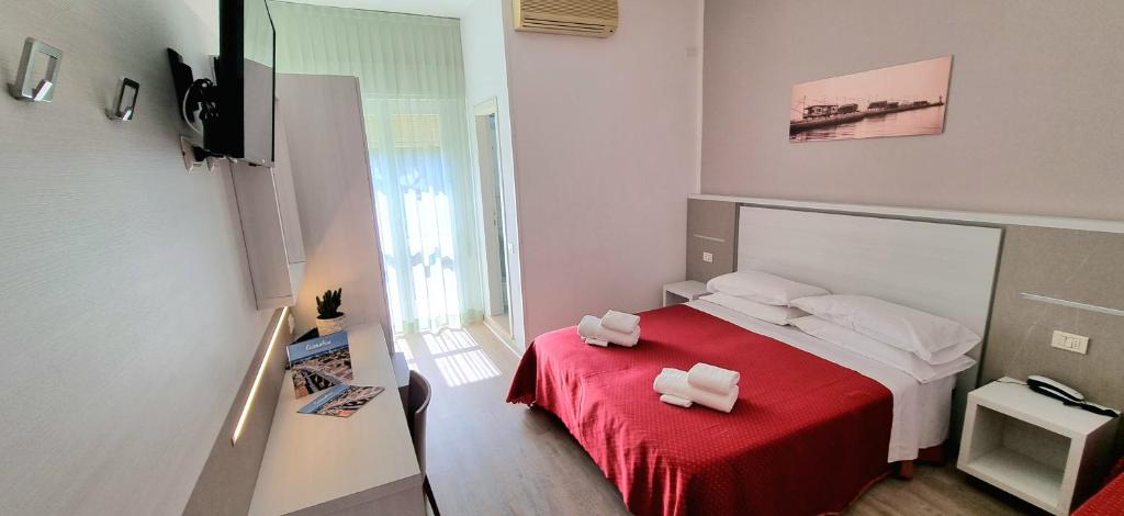 Postel nebo postele na pokoji v ubytování Hotel Camay