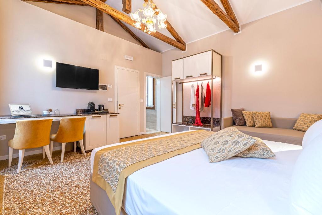 Posteľ alebo postele v izbe v ubytovaní Residenza La Duchessa Deluxe Rooms