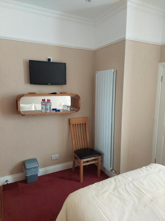 TV a/nebo společenská místnost v ubytování Parkway Guesthouse