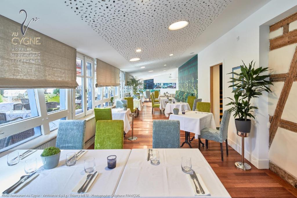Posezení v ubytování Hôtel Restaurant Au Cygne