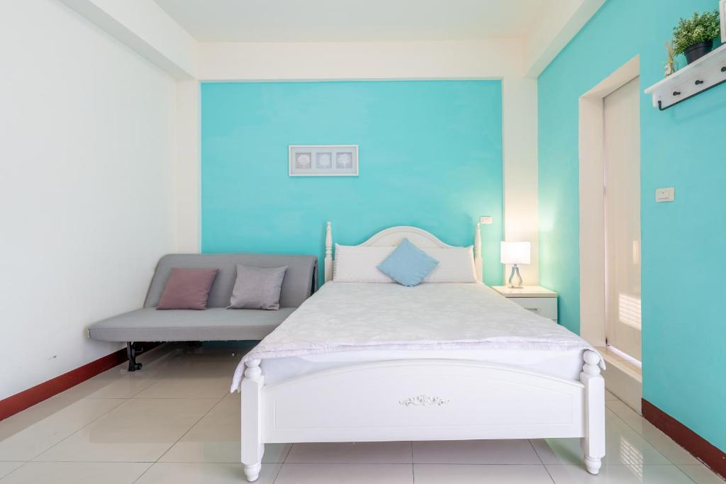 Postel nebo postele na pokoji v ubytování Happy Stay Inn