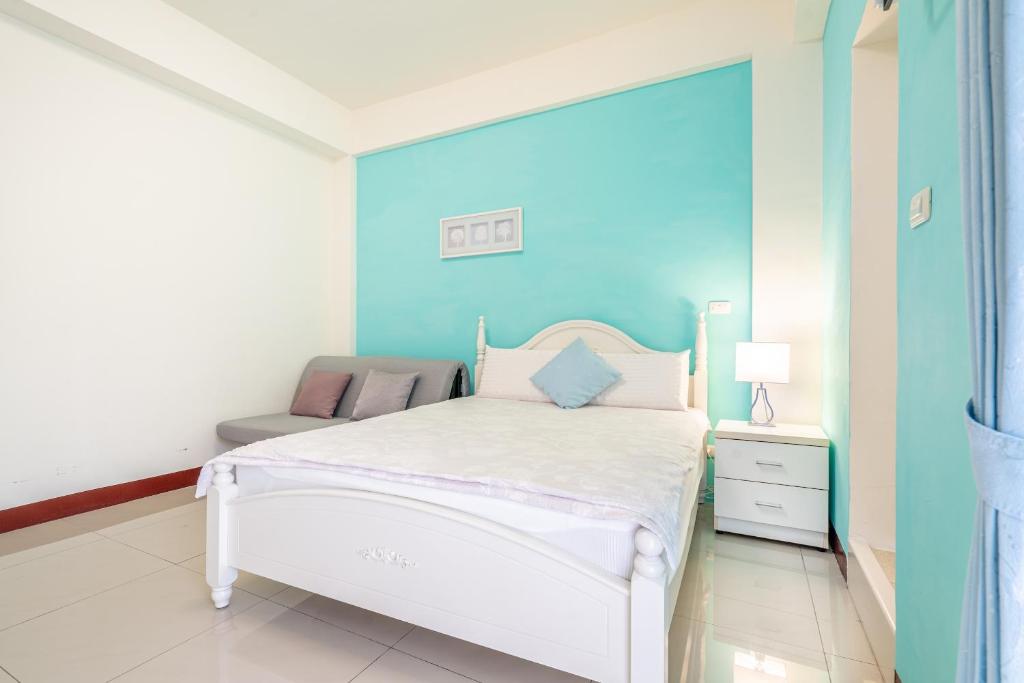 Postel nebo postele na pokoji v ubytování Happy Stay Inn