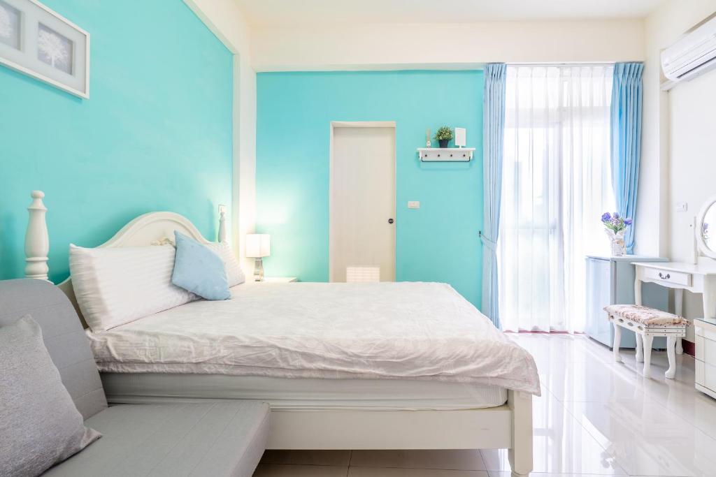 Postel nebo postele na pokoji v ubytování Happy Stay Inn