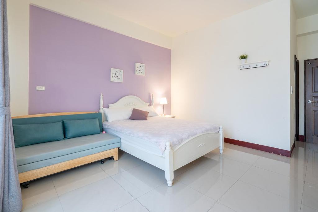Postel nebo postele na pokoji v ubytování Happy Stay Inn